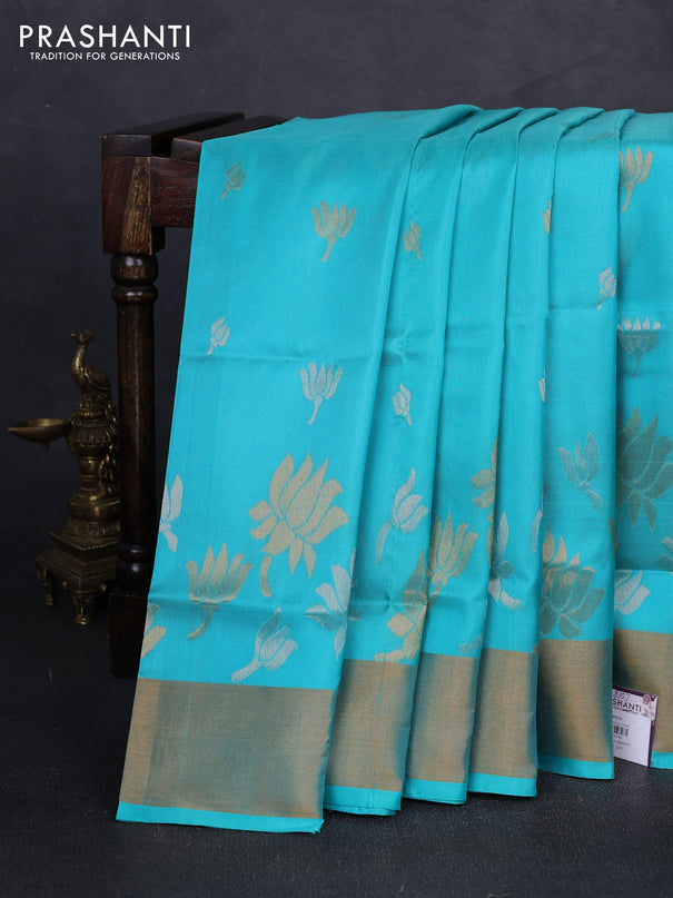 Pure uppada silk saree teal blue with silver & gold zari woven floral buttas and floral design zari woven border