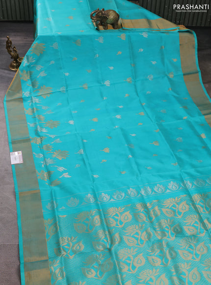 Pure uppada silk saree teal blue with silver & gold zari woven floral buttas and floral design zari woven border