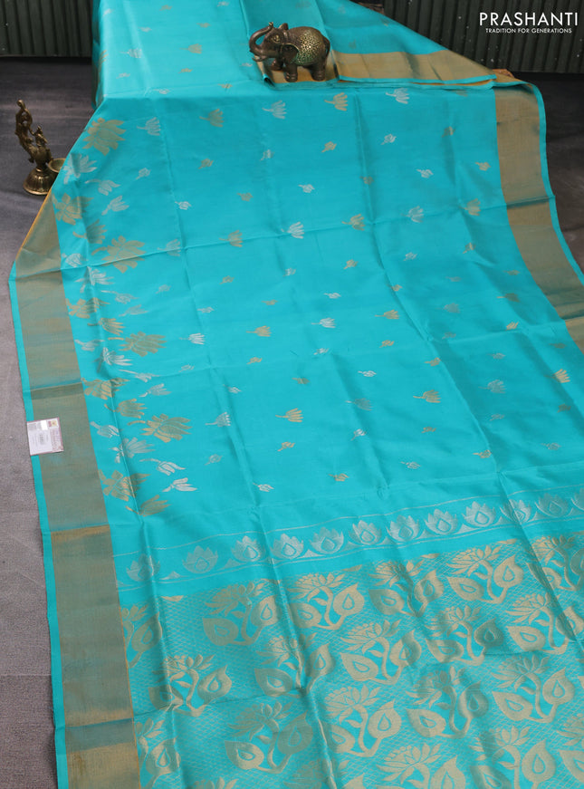 Pure uppada silk saree teal blue with silver & gold zari woven floral buttas and floral design zari woven border