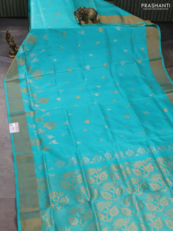 Pure uppada silk saree teal blue with silver & gold zari woven floral buttas and floral design zari woven border