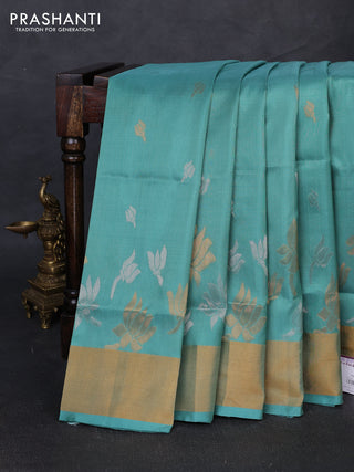 Pure uppada silk saree teal green shade with silver & gold zari woven floral buttas and floral design zari woven border