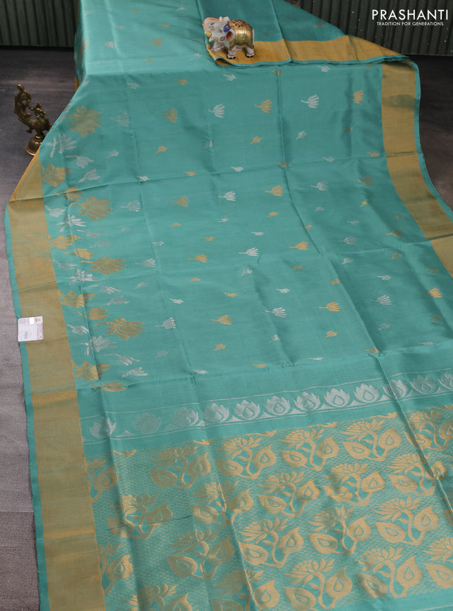 Pure uppada silk saree teal green shade with silver & gold zari woven floral buttas and floral design zari woven border