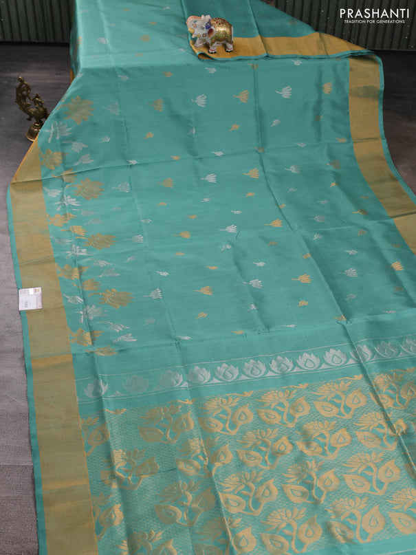 Pure uppada silk saree teal green shade with silver & gold zari woven floral buttas and floral design zari woven border