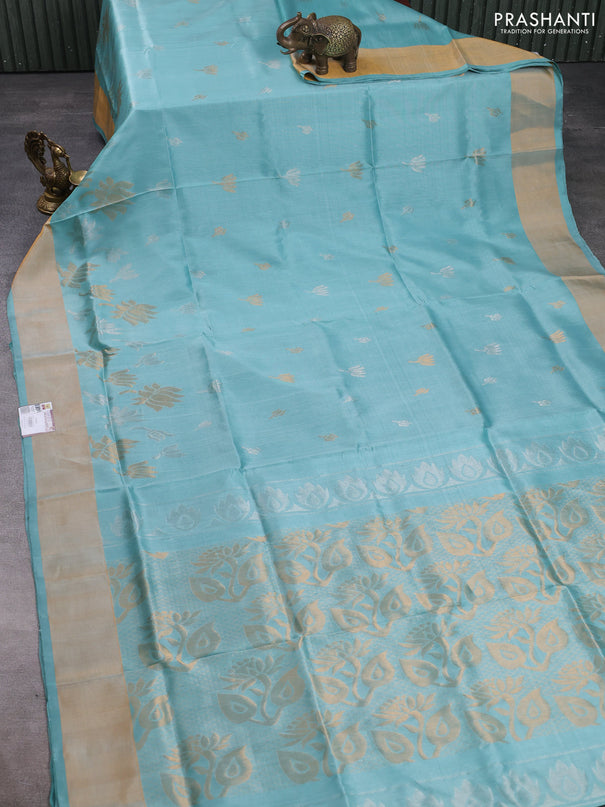 Pure uppada silk saree mild teal blue with silver & gold zari woven floral buttas and floral design zari woven border