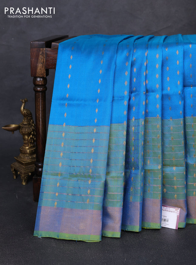 Pure uppada silk saree cs blue and dual shade of light green with allover zari woven buttas and long zari woven border