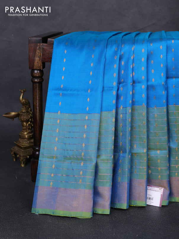 Pure uppada silk saree cs blue and dual shade of light green with allover zari woven buttas and long zari woven border