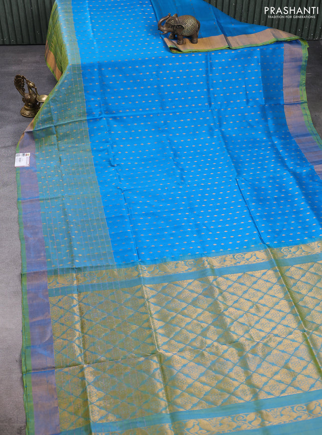 Pure uppada silk saree cs blue and dual shade of light green with allover zari woven buttas and long zari woven border