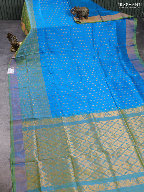 Pure uppada silk saree cs blue and dual shade of light green with allover zari woven buttas and long zari woven border