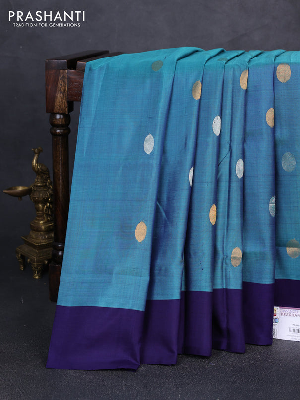 Pure uppada silk saree dual shade of teal blue and blue with silver & gold zari woven coin buttas and simple border