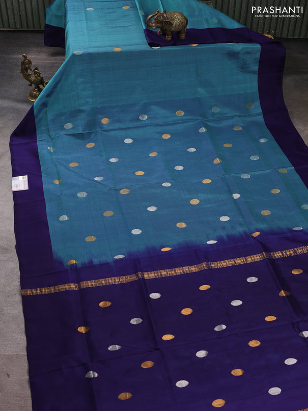 Pure uppada silk saree dual shade of teal blue and blue with silver & gold zari woven coin buttas and simple border