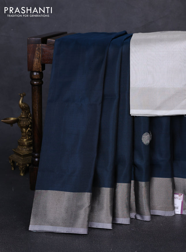 Pure uppada silk saree peacock green and pastel grey with silver zari woven coin buttas and silver zari woven border