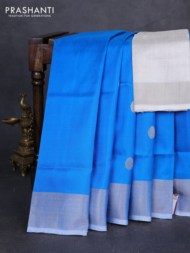 Pure uppada silk saree cs blue with silver zari woven coin buttas and silver zari woven border