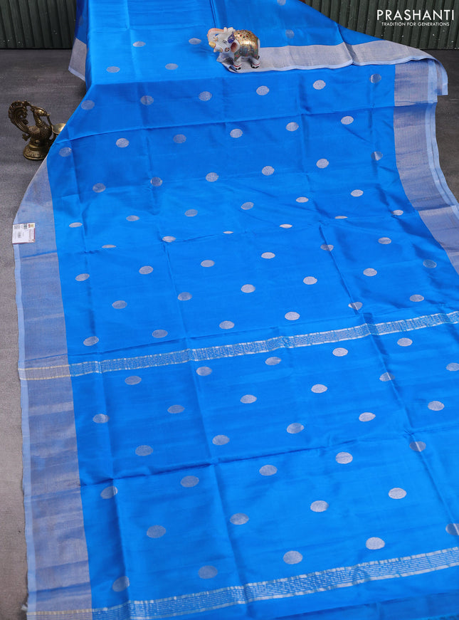 Pure uppada silk saree cs blue with silver zari woven coin buttas and silver zari woven border