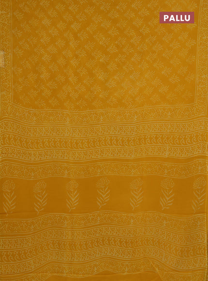 Georgette saree yellow with allover butta block prints and printed border