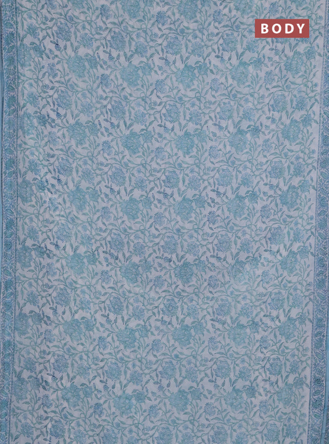 Georgette saree off white and light blue with allover kalamkari block prints and simple border