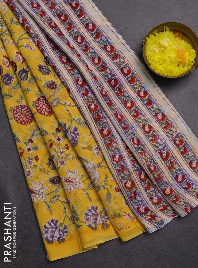 Georgette saree yellow and cream with allover kalamkari block prints and simple border