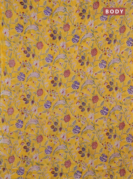 Georgette saree yellow and cream with allover kalamkari block prints and simple border