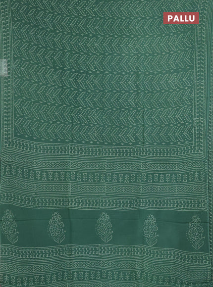 Georgette saree green with allover block prints and printed border