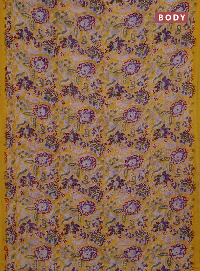Georgette saree yellow with allover kalamkari block prints and simple border