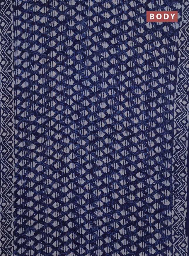 Georgette saree indigo blue with allover dabu prints and printed border