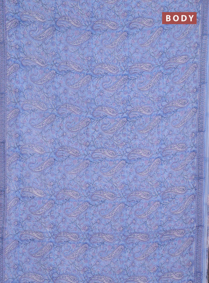 Georgette saree light blue and off white with allover block prints and printed border