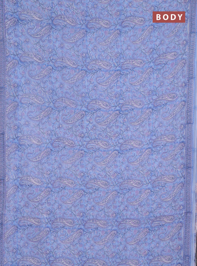 Georgette saree light blue and off white with allover block prints and printed border