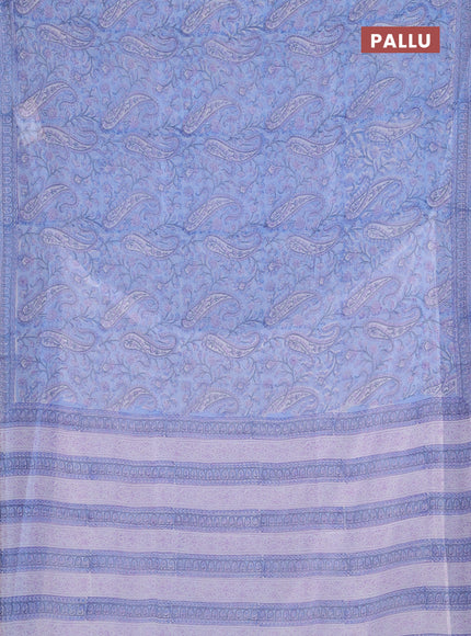 Georgette saree light blue and off white with allover block prints and printed border