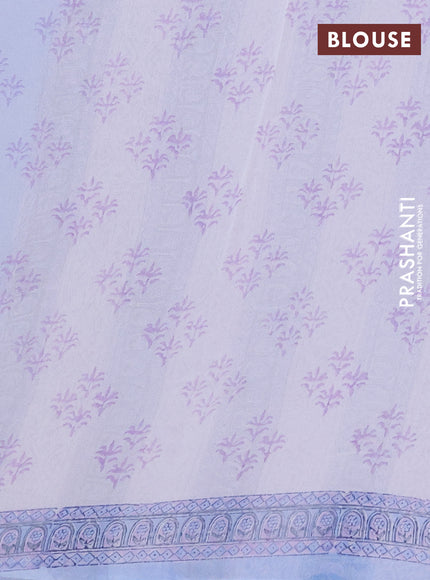 Georgette saree light blue and off white with allover block prints and printed border