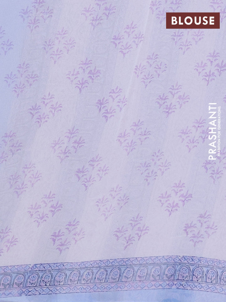 Georgette saree light blue and off white with allover block prints and printed border