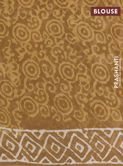 Georgette saree khaki shade with allover dabu prints and printed border