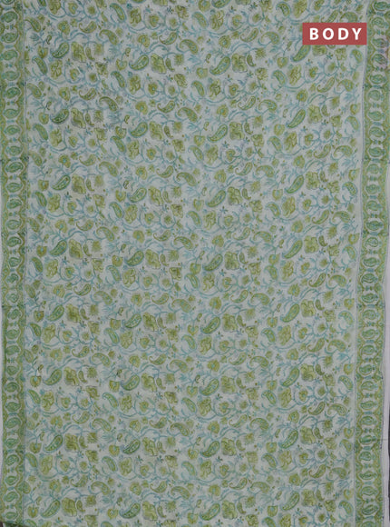 Georgette saree cream and lime green with allover block prints and printed border
