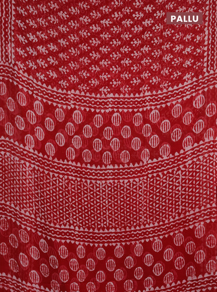 Georgette saree rustic orange with allover dabu prints and printed border