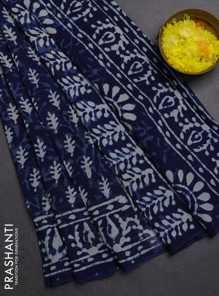 Georgette saree indigo blue with allover dabu prints and printed border