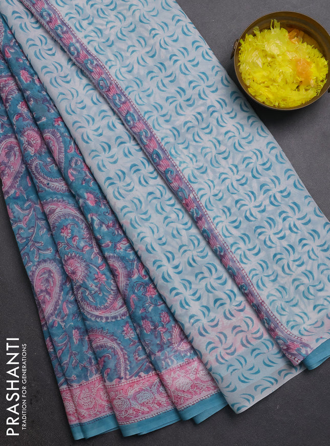 Georgette saree teal blue and light pink with allover block prints and printed border