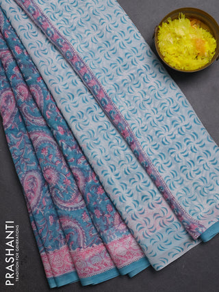 Georgette saree teal blue and light pink with allover block prints and printed border