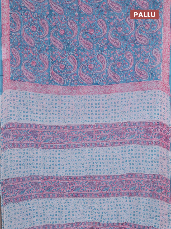 Georgette saree teal blue and light pink with allover block prints and printed border