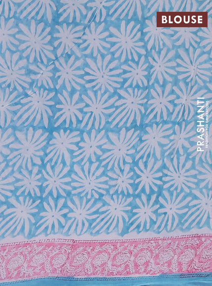 Georgette saree teal blue and light pink with allover block prints and printed border