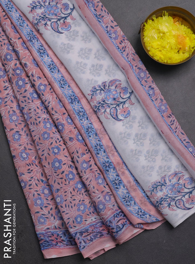 Georgette saree pastel peach and blue with allover block prints and printed border