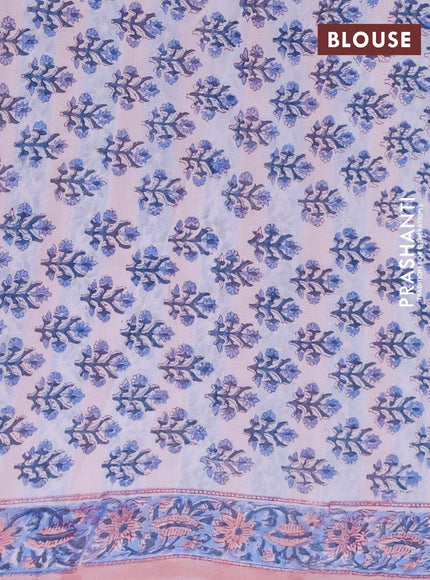 Georgette saree pastel peach and blue with allover block prints and printed border