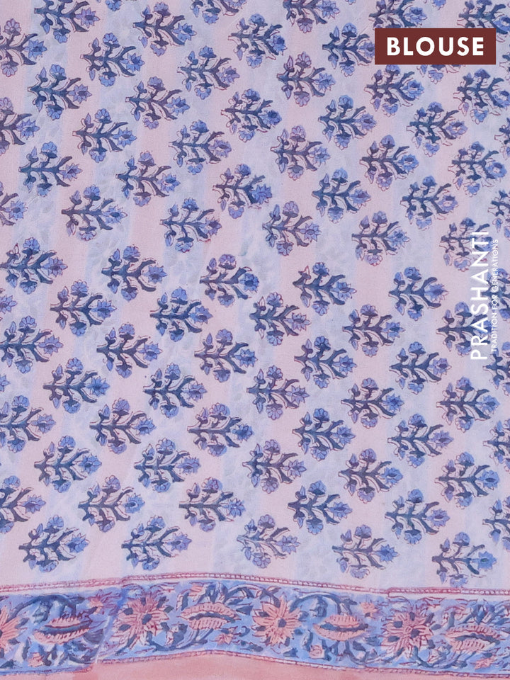 Georgette saree pastel peach and blue with allover block prints and printed border