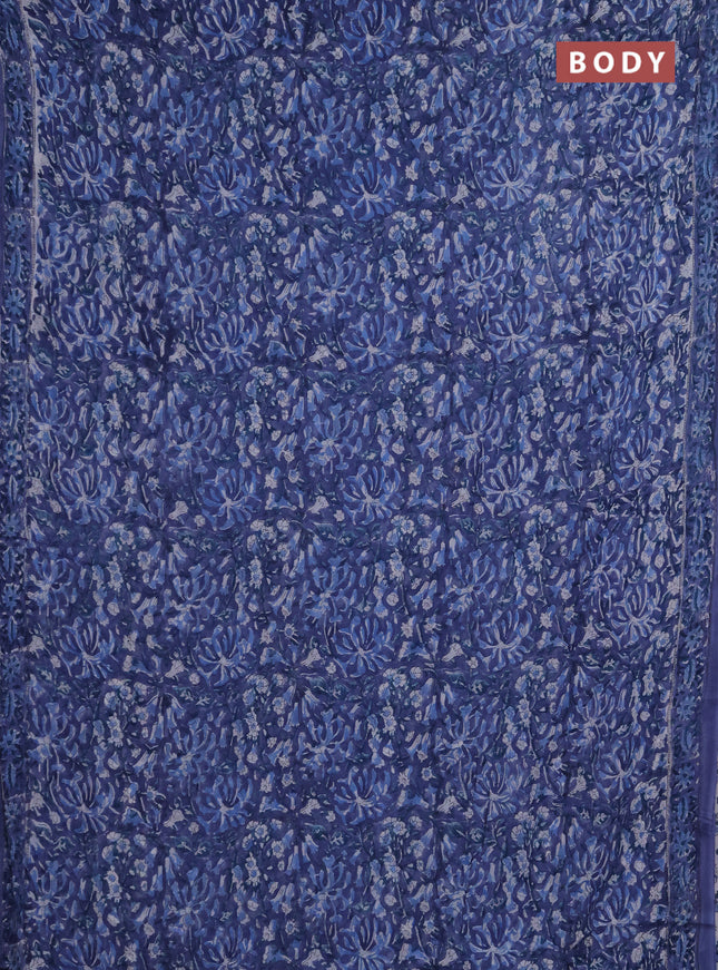 Georgette saree blue with allover block prints and printed border