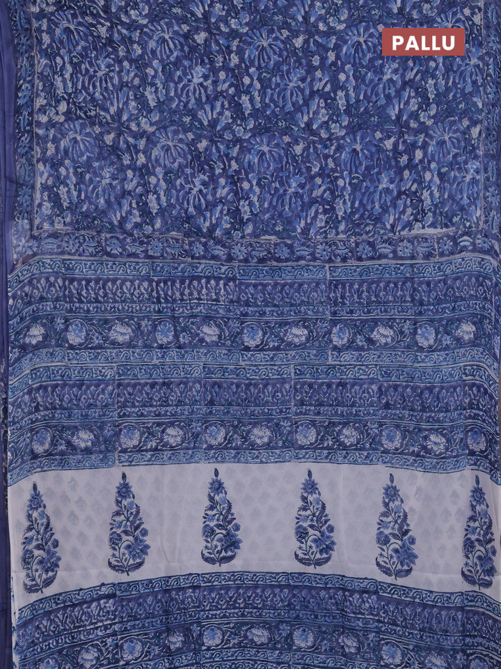 Georgette saree blue with allover block prints and printed border