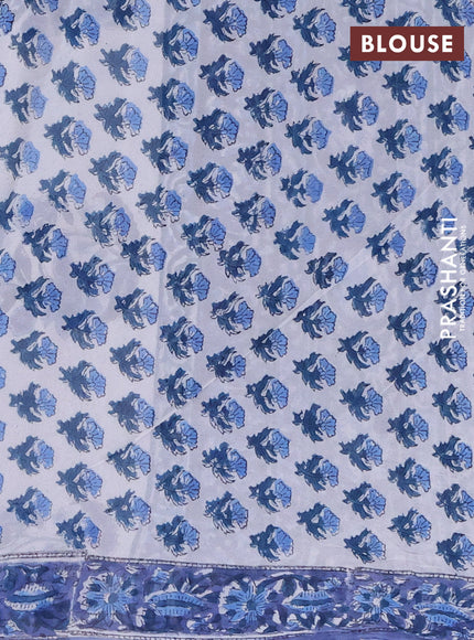 Georgette saree blue with allover block prints and printed border