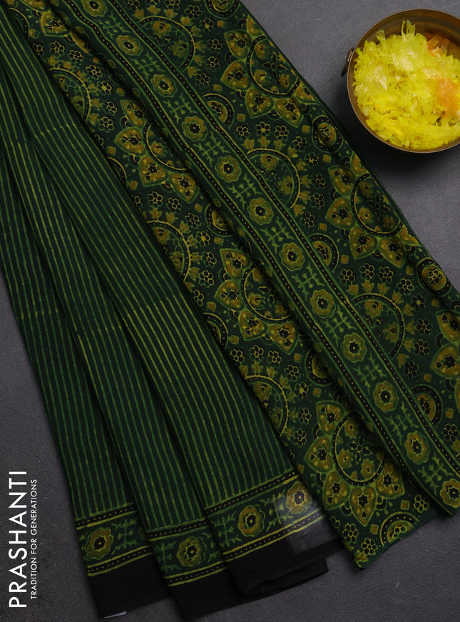 Georgette saree bottle green and black with allover stripe pattern and printed border