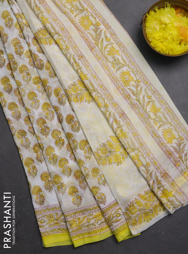 Georgette saree off white and yellow with allover floral butta block prints and printed border