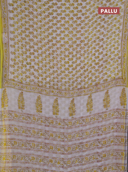 Georgette saree off white and yellow with allover floral butta block prints and printed border