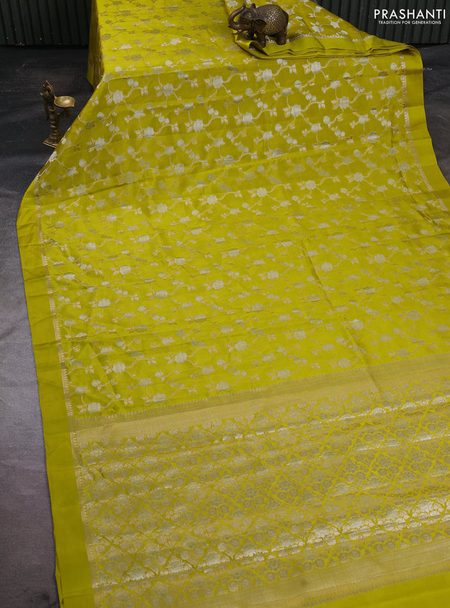 Poona silk saree lime green with allover silver zari weaves and simple border