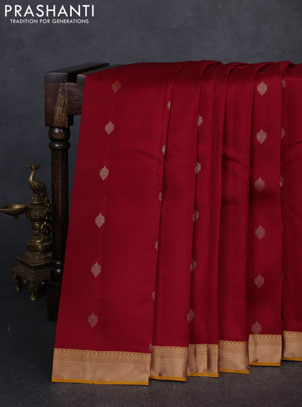 Kanchipuram silk saree maroon and mustard yellow with allover zari woven buttas and zari woven border