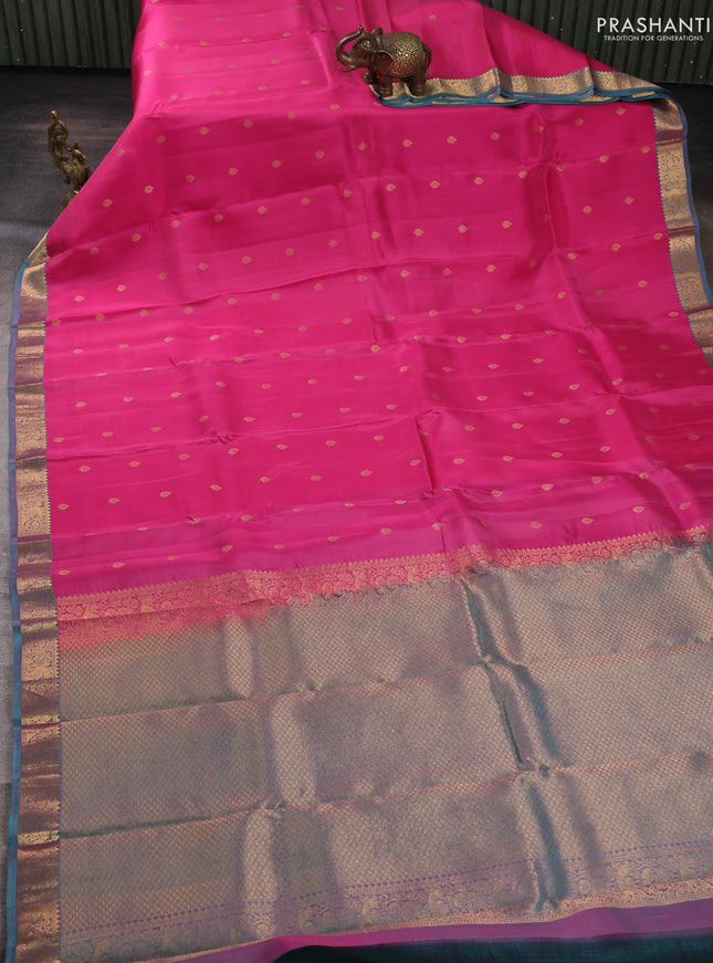 Kanchipuram silk saree pink and dual shade of teal green with allover zari woven buttas and zari woven border