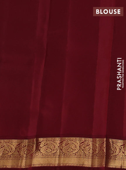Kanchipuram silk saree dual shade of peacock green and maroon with allover zari woven buttas and zari woven border